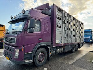 volvo-fm-300-6x2-live-stock-4-layers-moving-floor-manual-gear-dhollandia-lift